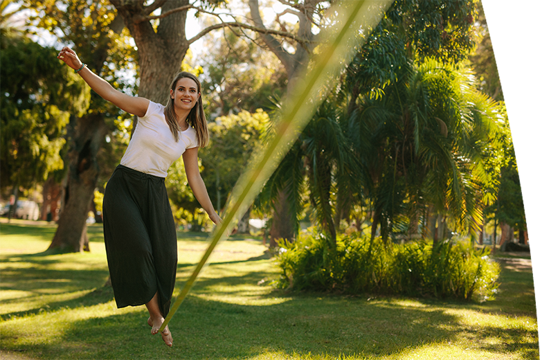 woman balancing her walk on rope